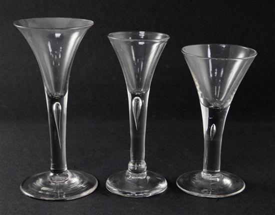 Three drawn trumpet ale glasses, c.1740, 15.5 - 18.5cm